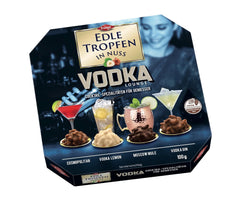 Edle Tropfen w Nuss Vodka Lounge 100g, pralinki czekoladowe nadziewane płynem z polewą z mlecznej czekolady i chrupiącymi kawałkami orzechów laskowych