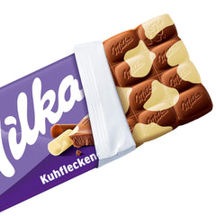 Milka Cow Spots – Alpejska czekolada mleczna z białą czekoladą w kształcie krowich kropek – 24 x 90g