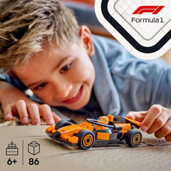 LEGO City Wyścigówka F1 z samochodem wyścigowym Mclaren — model zabawkowy Formuły 1 z samochodem wyścigowym i minifigurką — mały prezent dla chłopców i dziewcząt od 6 lat lub fanów sportów motorowych 60442 Zestawy do budowania Besuche den LEGO-Store