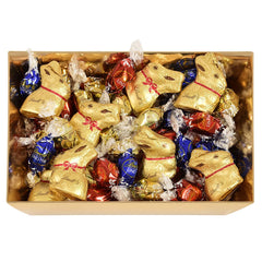 Kolorowe czekoladowe gniazdko wielkanocne Lindt | 310 g | 8 x Mini Złote Króliczki, 26 x Jajka Lindor z mlecznej czekolady, 15 x Jajka Lindor z białą czekoladą, 10 x Jajka Lindor z ciemnej czekolady | Czekolada Wielkanocna | Prezent Czekoladowy