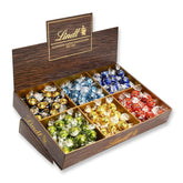 Lindt Chocolate LINDOR, ekspozytor na ladę | 1718 g | Około. 138 trufli w odmianach Mleczna, Czarna 70%, Półbrązowa, Stracciatella, Biała, Pistacjowa | Czekoladowy zestaw upominkowy | Czekolada Prezentowa | Pakiet zbiorczy