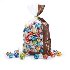 Mieszanka czekoladowa LINDOR | 1371 g | Około. 109 kulek: Kulki z mlecznej czekolady i LINDOR z kremem truskawkowym | Worek 1 kg, ok. 80 kulek czekoladowych z białej czekolady z kremem truskawkowym