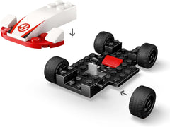 LEGO City Samochody wyścigowe F1 Williams Racing i Haas F1 Racing — zabawka Formuły 1 z samochodami do zbudowania i 2 minifigurkami kierowców wyścigowych — pomysły na drobne prezenty dla chłopców i dziewcząt od 4 lat 60464 Zestawy do budowania Szukaj sklepu LEGO