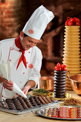 Plăcintă cu ciocolată și trufe Reber Bites, trufe cu brandy pe nuga cremoasă, acoperită cu ciocolată delicată cu lapte alpină, 40g (1 bucată)