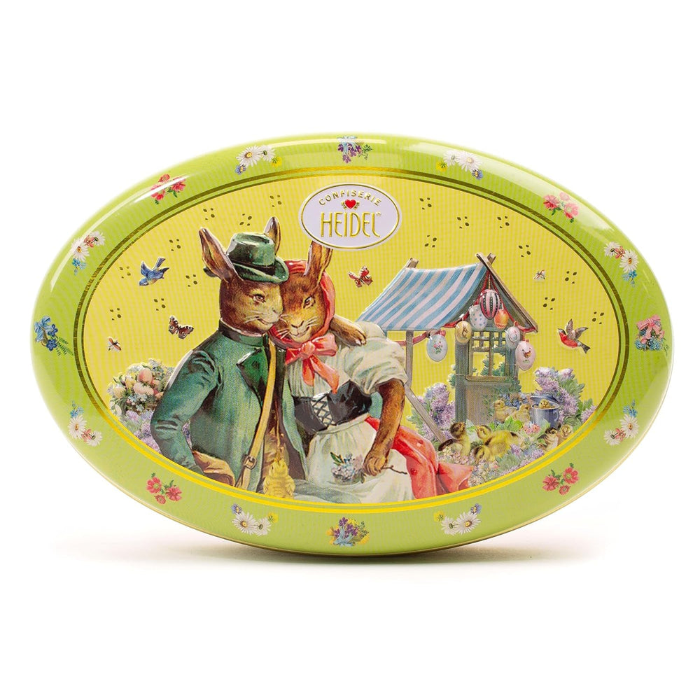 Cutie cadou Heidel cu felicitări de Paște 183g, praline premium din ciocolată cu lapte cu cutie metalică decorativă, ideală ca și cadou de Paște