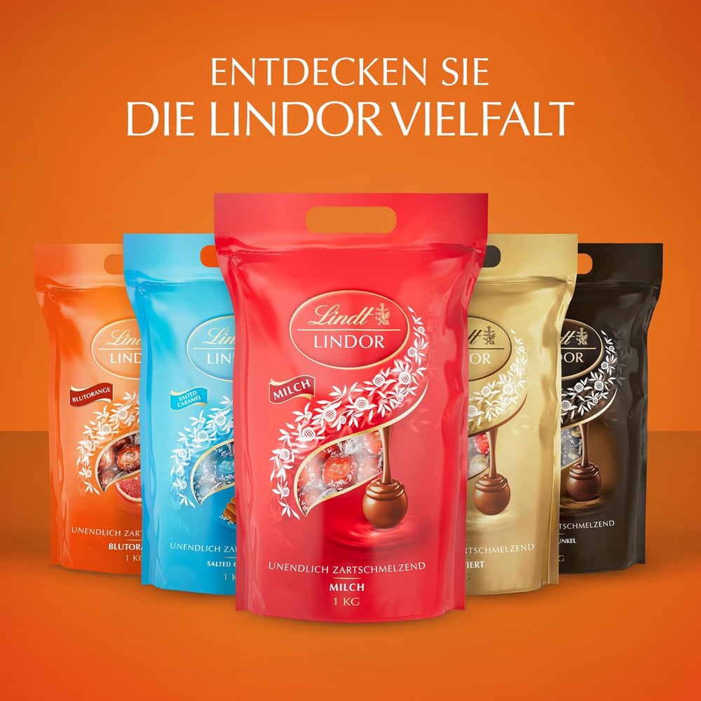 Lindt LINDOR Czerwone Pomarańczowe Kulki Czekoladowe | 1 kg zamykana torebka | ok. 80 cukierków czekoladowych z rozpływającym się w ustach nadzieniem | Opakowanie zbiorcze, prezent czekoladowy