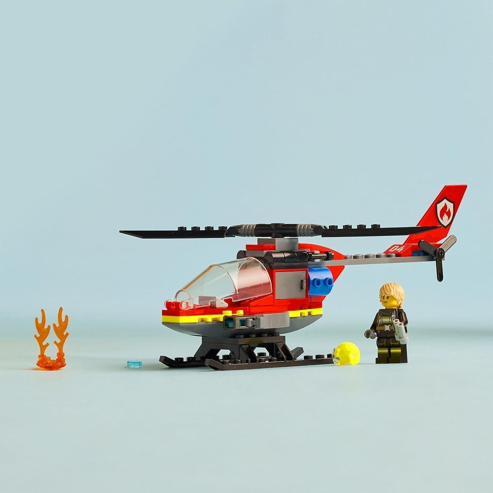 LEGO City Helikopter straży pożarnej, zestaw zabawkowy helikopter i figurka pilota, helikopter strażacki zapewniający pomysłową zabawę, prezent dla dzieci, chłopców i dziewcząt od 5 lat 60411 Zestawy do budowania Besuche den LEGO-Store