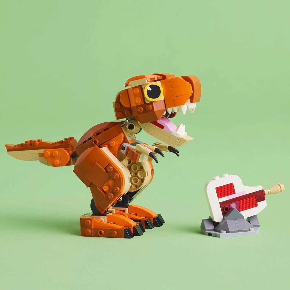 LEGO Jurassic World Little Eatie: zabawka do budowania T.Rex dla chłopców i dziewcząt 7-letni zestaw do budowania dinozaurów Model prezentowy dla dzieci z ruchomymi ustami, głową i ogonem 76967 Zestawy do budowania Besuche den LEGO-Store