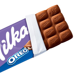 Milka Oreo – Alpejska czekolada mleczna wypełniona chrupiącymi kawałkami ciastek Oreo i gładkim kremem waniliowym – 100g