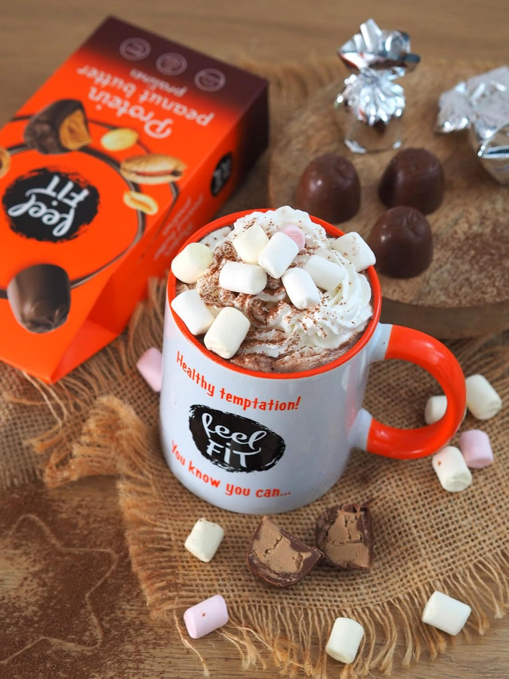 Feel FIT Praliny proteinowe z masłem orzechowym w wysokiej jakości mlecznej czekoladzie, bez dodatku cukru, 17% białka, bezglutenowe 66g (1 opakowanie)