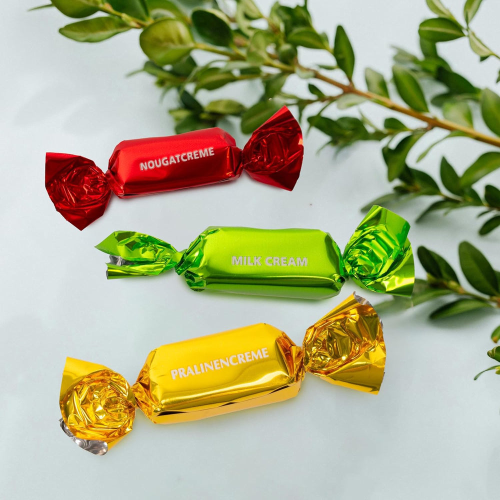 Heidel Kartka Wielkanocna Pudełko upominkowe 183g, praliny z mlecznej czekolady premium z ozdobnym metalowym pudełkiem, idealne na prezent wielkanocny