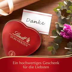 Lindt Czekolada od Serca | 30 g | 6 pralin w Marc de Champagne, Coeur à l'Orange, chrupiąca mleczna czekolada, pomarańczowy marcepan w pięknym pudełku w kształcie serca | Prezent czekoladowy | Czekoladowy prezent