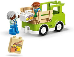 LEGO DUPLO Miejskie pszczelarstwo i ule, zabawka edukacyjna dla małych dzieci z 2 figurkami i ruchomą ciężarówką, zestaw do budowania i przebudowy, zabawka dla małych dzieci od 2 lat 10419 Zestawy do budowania Besuche den LEGO-Store