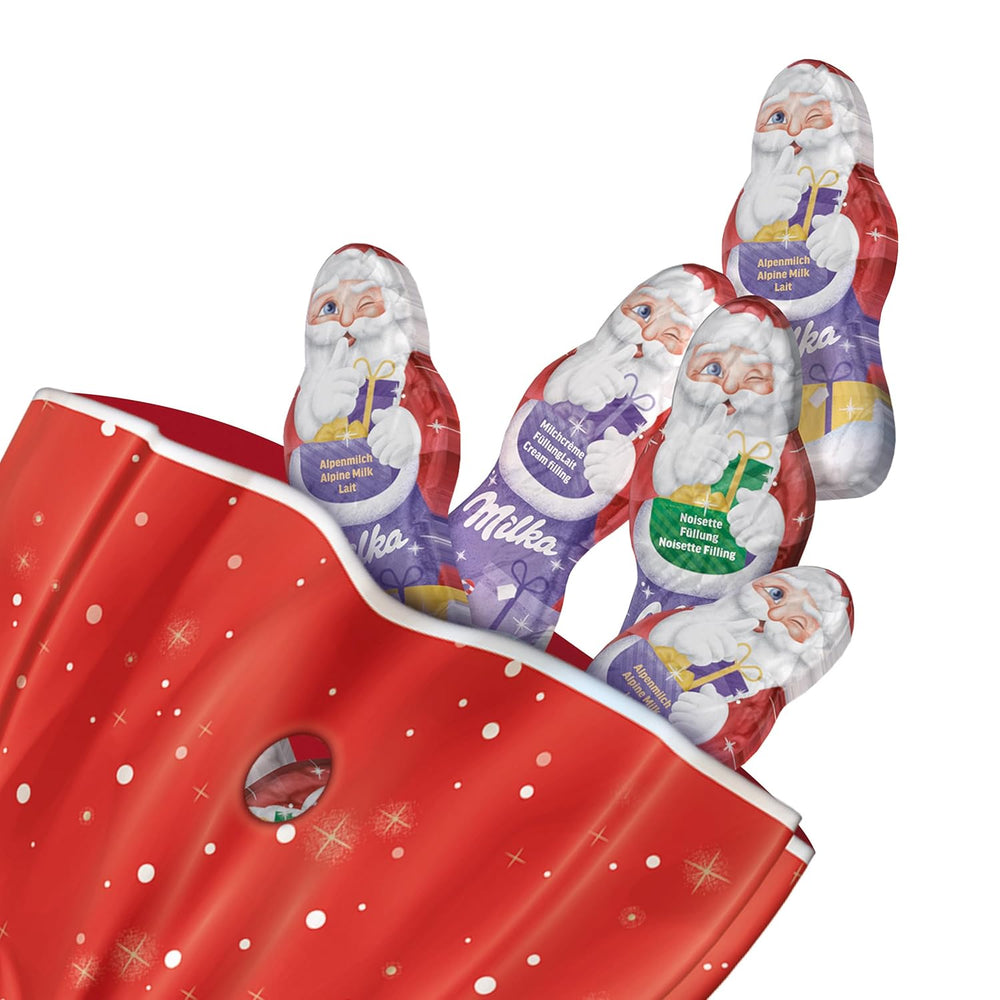 Milka Mini Santas – Mieszanka mleka alpejskiego, śmietanka mleczna i orzechy laskowe w świątecznym opakowaniu jednostkowym – 120g