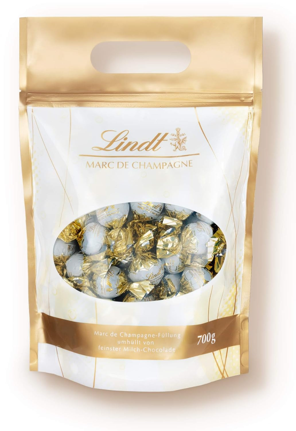 Kulki czekoladowe LINDOR z solonym karmelem | ok. 80 kulek z mlecznej czekolady z nadzieniem solonym karmelem | Opakowanie zbiorcze i kulki czekoladowe Marc de Champagne | 700 gr
