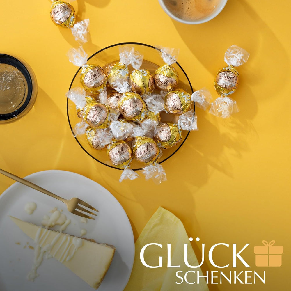 Czekolada Lindta | Torba na sernik LINDOR | 1 kg | 80 Kulek z białej mlecznej czekolady z rozpływającym się w ustach sernikiem | Prezent w postaci czekolady do dzielenia się