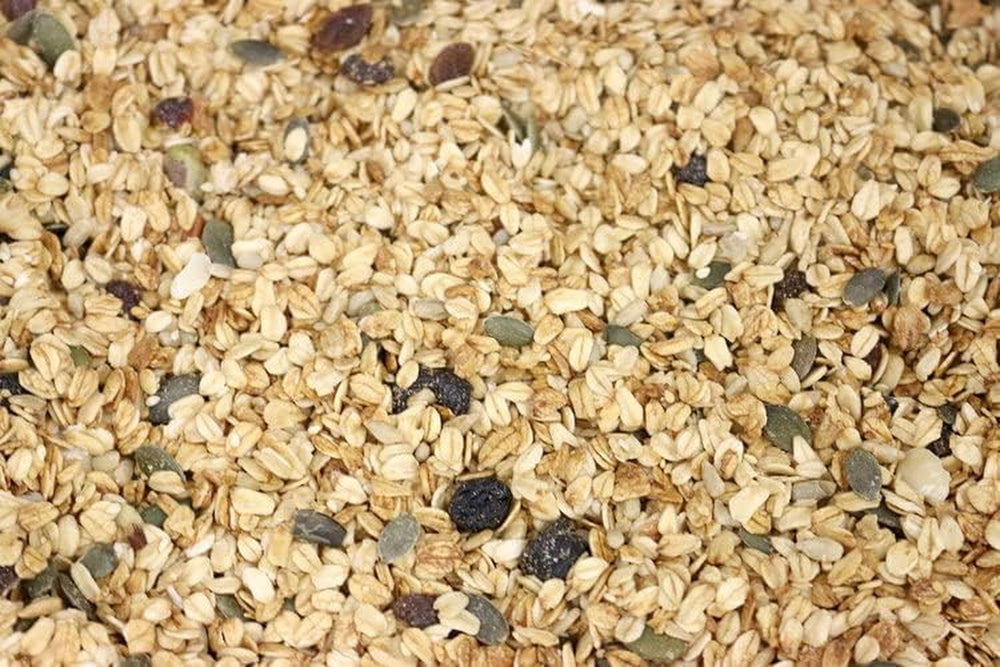 Muesli Deluxe Wholefood Earth - Mieszanka płatków z suszonymi owocami, orzechami i nasionami 1 kg | Bez GMO | Bogaty w błonnik
