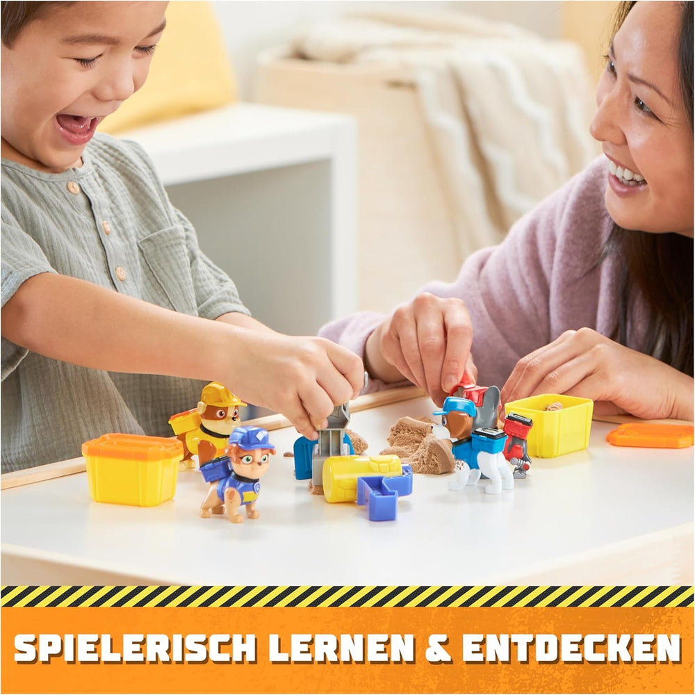 Rubble & Crew – Actionfiguren-Set mit Rubble & Mix Figur, 2 Bauspielzeugen und 85g Kinetic Sand Build-it-Sand, Spielzeug geeignet für Kinder ab 3 Jahren