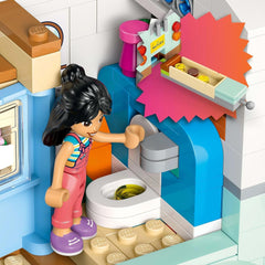 Przyczepa LEGO Friends, zestaw do budowania do odgrywania ról z przyczepą kempingową, prezent dla dziewczynek w wieku od 7 lat, kreatywny zestaw z 3 minifigurkami i figurką zwierzątka fretki 42663 Zestawy do budowania Besuche den LEGO-Store