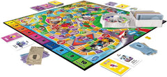Rodzinna gra planszowa Hasbro Game of Life dla 2–4 ​​graczy w wieku od 8 lat. Zawiera kredki