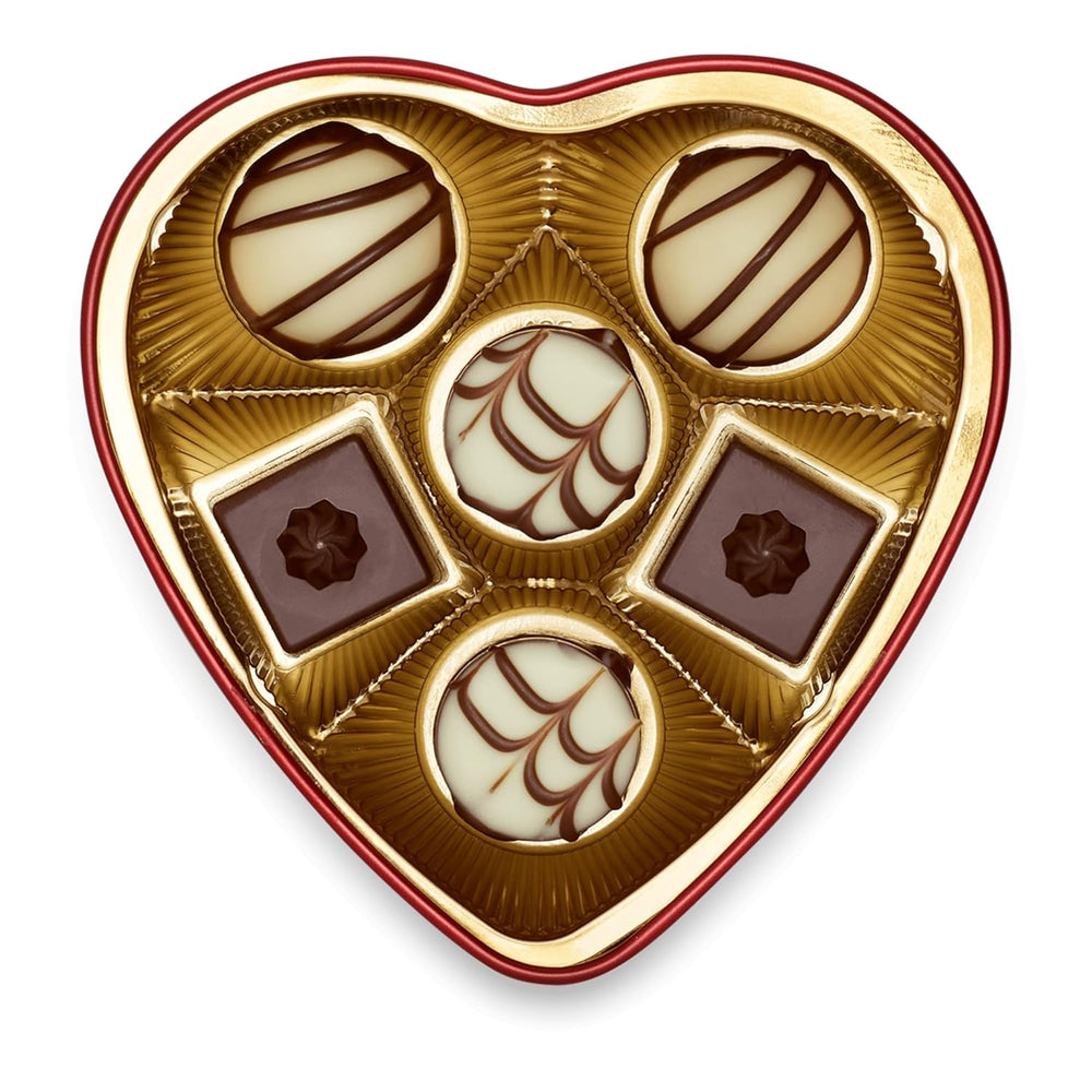 Lindt Czekolada od Serca | 30 g | 6 pralin w Marc de Champagne, Coeur à l'Orange, chrupiąca mleczna czekolada, pomarańczowy marcepan w pięknym pudełku w kształcie serca | Prezent czekoladowy | Czekoladowy prezent