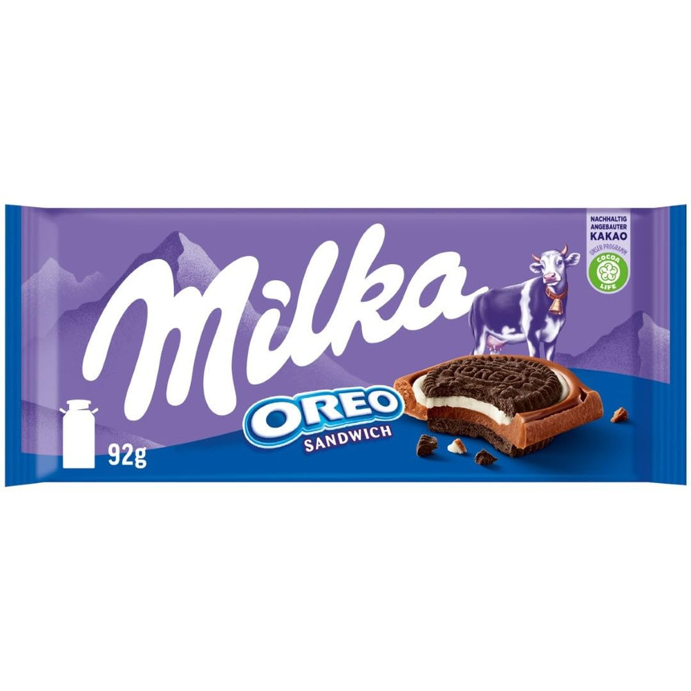 Milka Oreo Sandwich – Alpejska czekolada mleczna wypełniona chrupiącymi kawałkami ciasteczek Oreo i gładkim kremem waniliowym – 92g