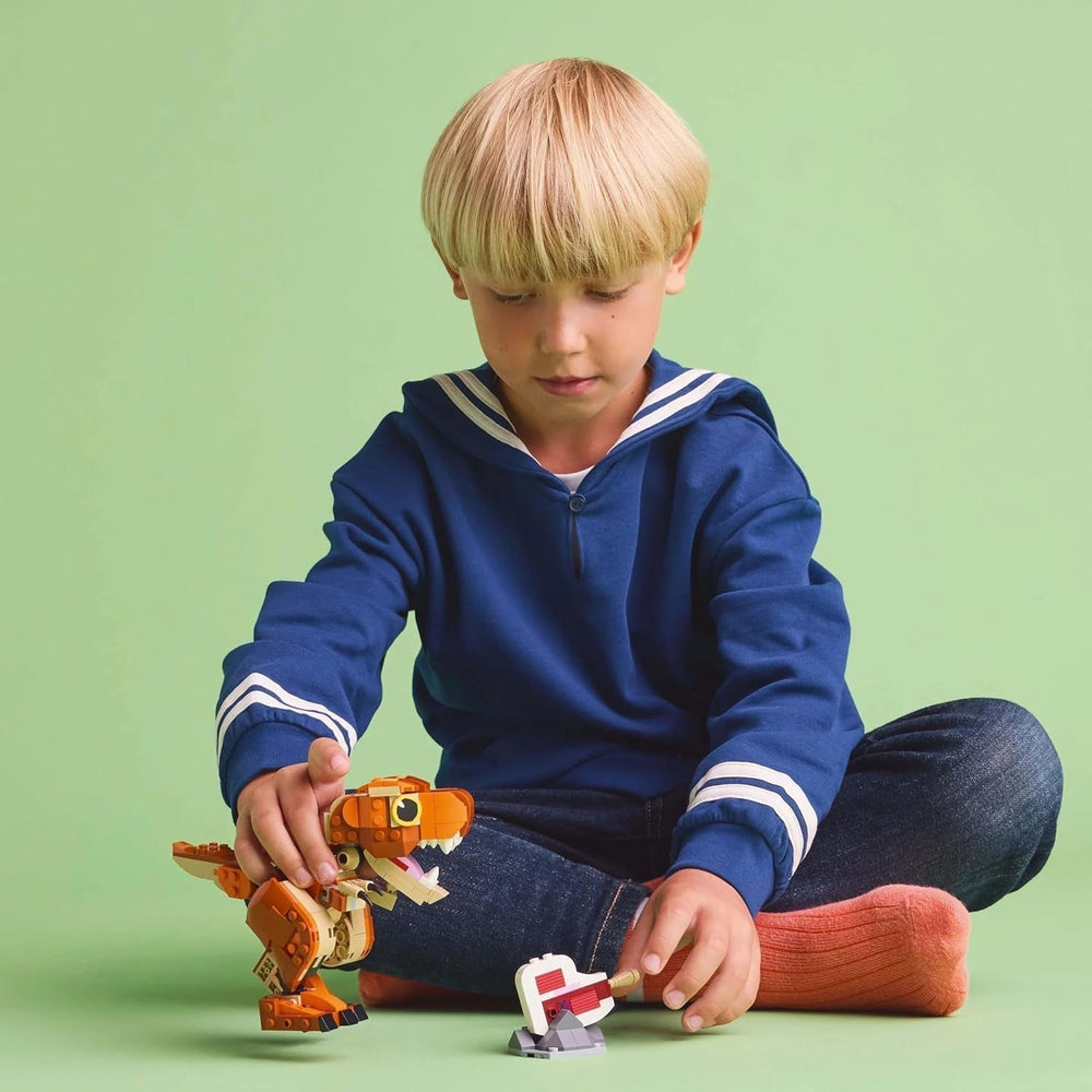 LEGO Jurassic World Little Eatie: zabawka do budowania T.Rex dla chłopców i dziewcząt 7-letni zestaw do budowania dinozaurów Model prezentowy dla dzieci z ruchomymi ustami, głową i ogonem 76967 Zestawy do budowania Besuche den LEGO-Store