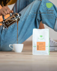 Cafea - Karibu I 100% Arabica I Boabe de cafea 250g I Ideală pentru aparate de cafea complet automate, cafea cu filtru și presă franceză cu arome de ciocolată, fructate și dulci I prăjire ușoară
