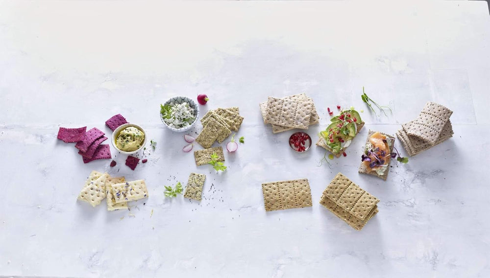 Betty Bossi Cracker Roller, idealny gadżet kuchenny do przygotowywania Knäckebrot i Crackern für raffiniertes Fingerfood. Teigschneider mit tollen Rezeptideen.