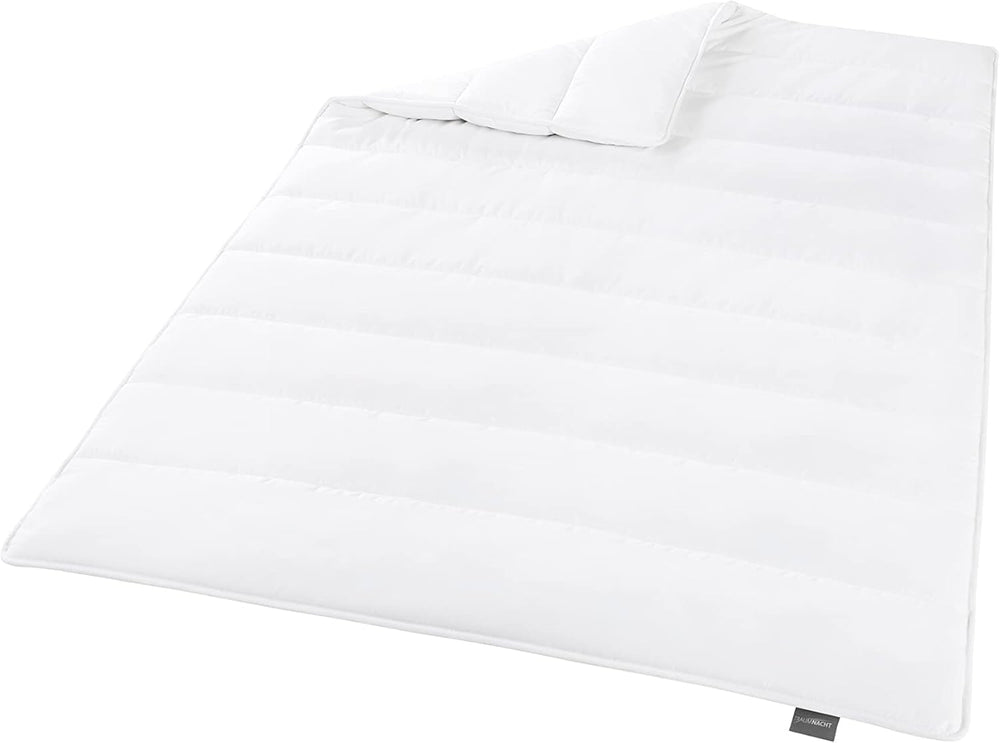 Koc energooszczędny Traumnacht - Wyjątkowo ciepły koc zimowy o gramaturze 1685 g, 100% mikrofibra, można prać w 60 stopniach, 135X200 cm, posiada certyfikat Oeko-Tex, wyprodukowany zgodnie z niemiecką normą jakości. Narzuty i kołdry Naty Shop