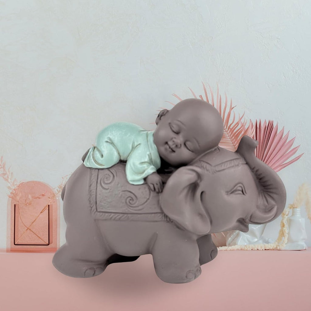Zen'Light Statue Buddha Bonze Sleeping on Elephant - Atmosferă Zen în spațiul tău sacru - frumoasă figură de bun augur -H 9.5 cm, Brown & Green Statuete si sculpturi Naty Shop